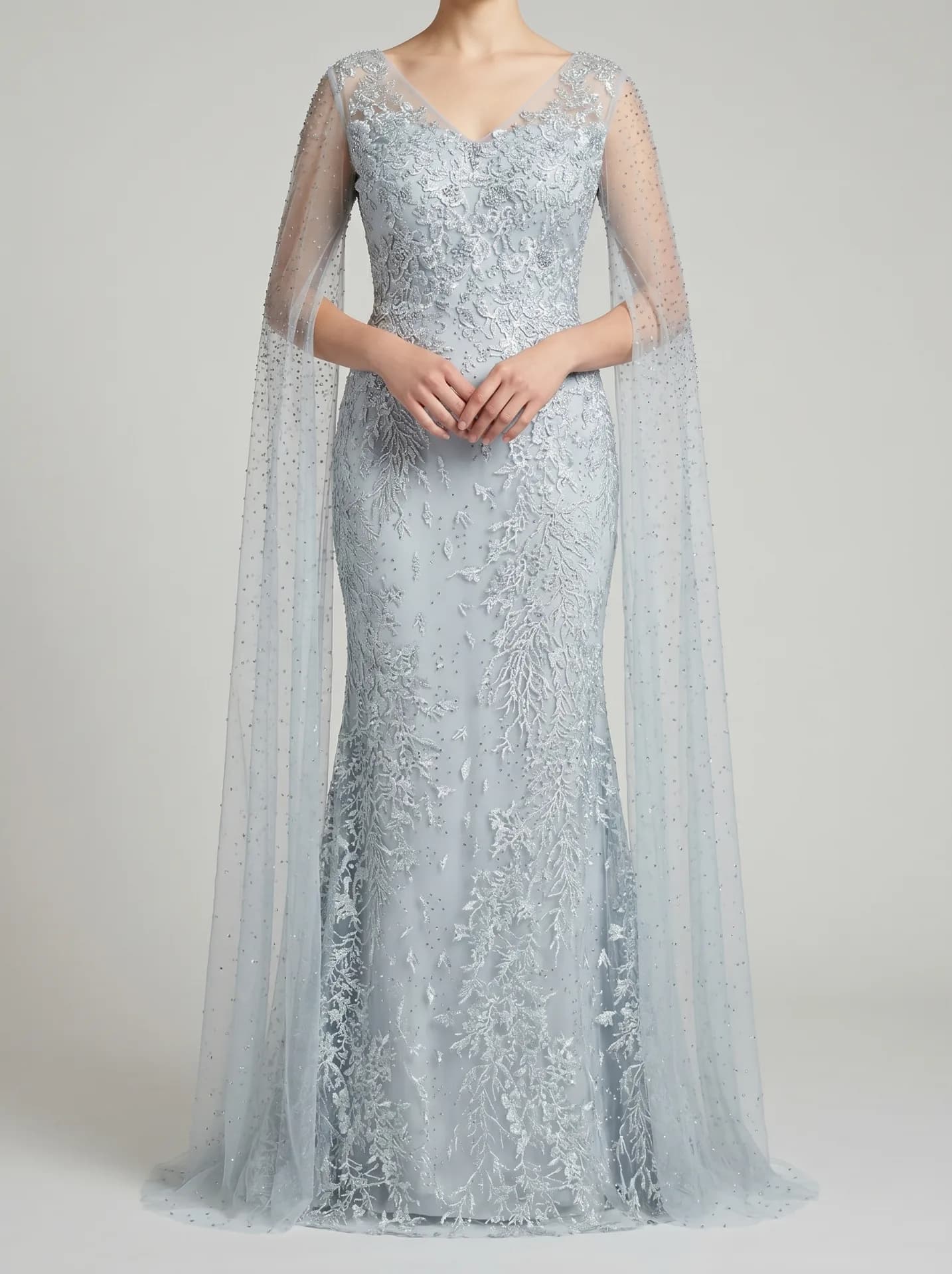 Light blue embellished evening dress with cape sleeves
